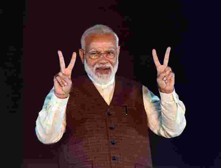 PM Modi表示，印度致力于进一步改善税收制度