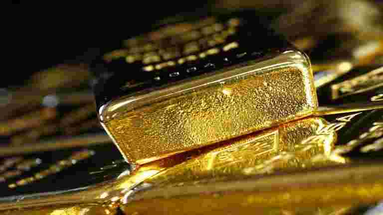 全球黄金价格稳定随着贸易协议怀疑抵消美国数据